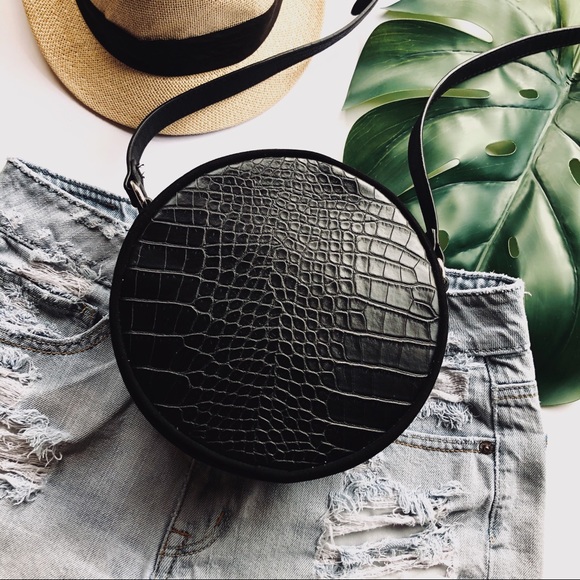 Handbags - round suede like / animal textured cross body bag